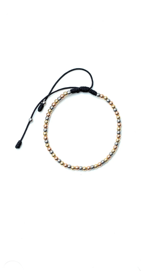 PULSERA OSLO TRES OROS
