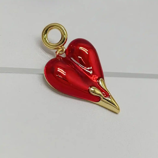 DIJE CORAZÓN DERRETIDO